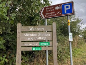 Shenton station and cutting parking sign, suggested start for the local walk.